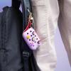 imageTouchland x Crocs Limited Edition Mist Case 1 Fl OZ Stylish Hand Sanitizer Spray Accessory with 5 JibbitzTM Charms and Keyring Pixie Lavender ColorSugarpop Pink